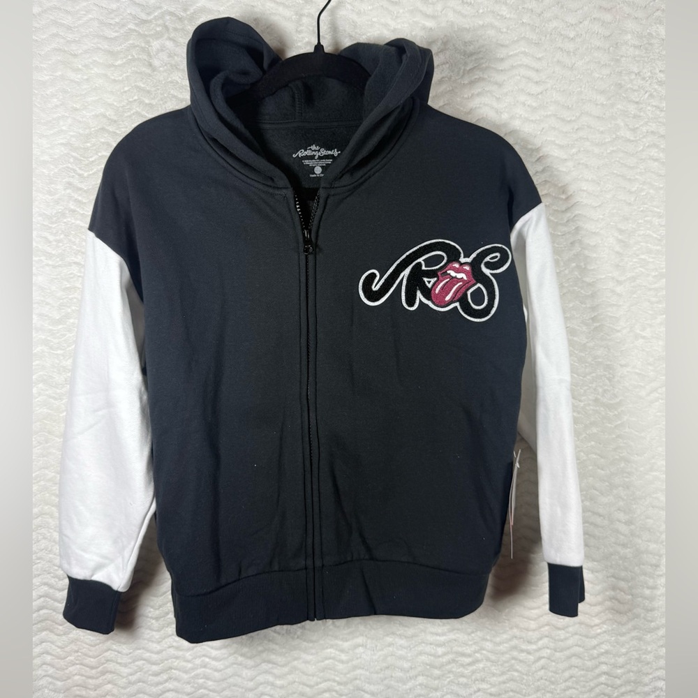 the Rolling Stones Black & White Hooded Zip Jacket with Iconic Tongue Patch.